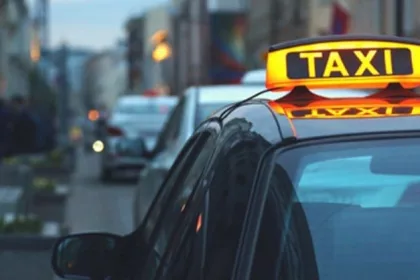 Taxi light on top of saloon vehicle