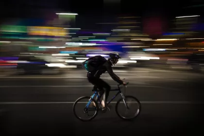 Cyclists and taxi divers