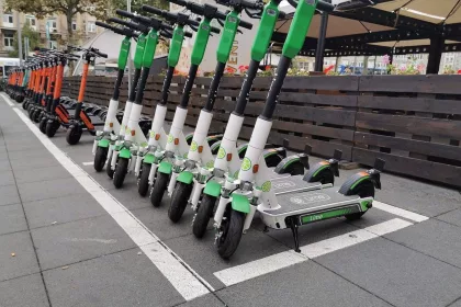 escooters lined up in parking bay
