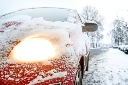 Snow on a car due to winter condition