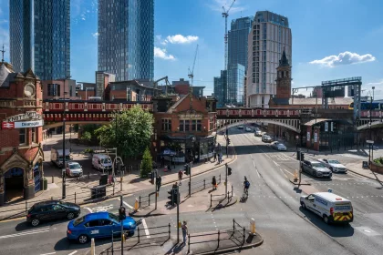 Cityscape of Deansgate outside the Deansgate Station, a famous area known for its shops, bars and restaurants on June 04, 2021 in Manchester, England