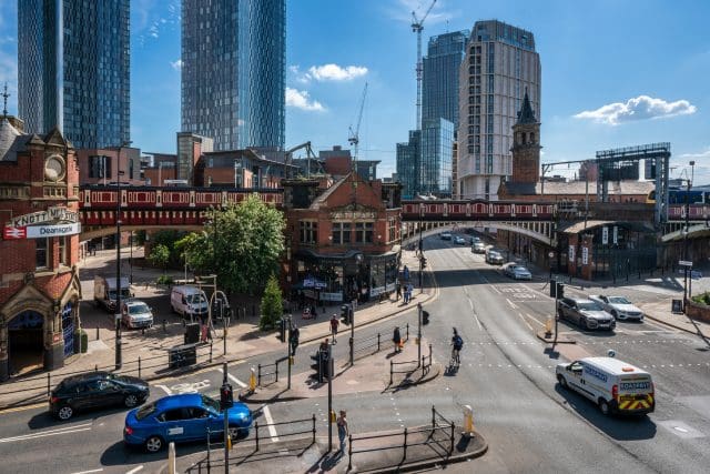 Cityscape of Deansgate outside the Deansgate Station, a famous area known for its shops, bars and restaurants on June 04, 2021 in Manchester, England