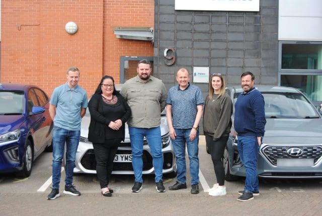 The Patons Insurance Fleet team stood outside of the Liverpool Office.