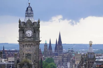 Edinburgh skyline featuring landmarks, including Balmoral Hotel clock tower