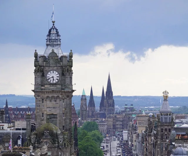 Edinburgh skyline featuring landmarks, including Balmoral Hotel clock tower