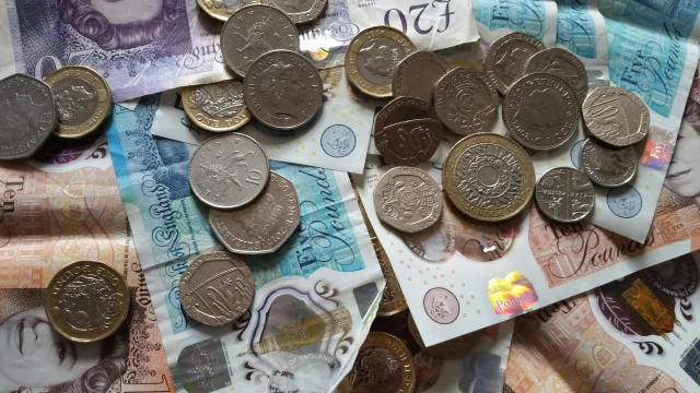 GBP scattered across a counter top