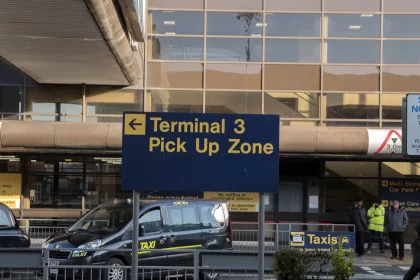 Direction Sign Terminal 3 At The Airport Of Manchester England