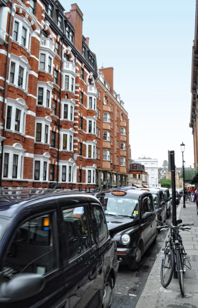 London Street lined with black cabs.