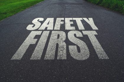 Message written on a road that says 'safety first'. Concept of safe driving and preventing traffic accident.
