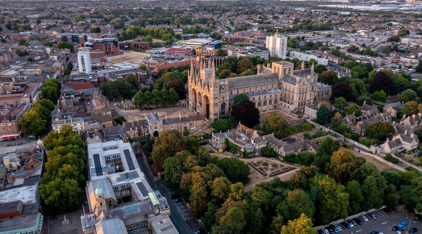 An aerial cityscape of Peterborough Cathedral and town centre