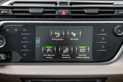 Close up shot of a modern car displaying electronic vehicle safety systems