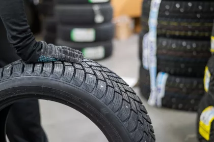 Vehicle tyres in a garage.