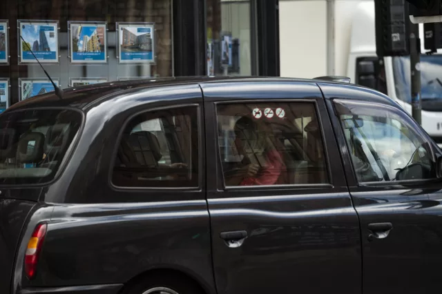 hackney carriage taxi in traffic