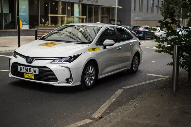 Private hire vehicle taxi for Bolt on a city road