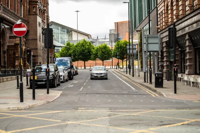 Private hire taxi on quiet city street
