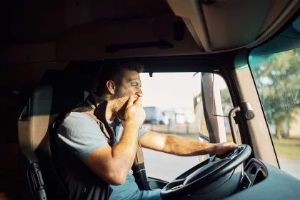 fleet driver yawning at the wheel