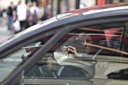 driver smoking inside vehicle