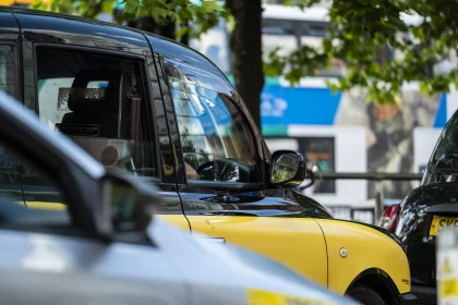 taxi and private hire vehicle waiting in traffic