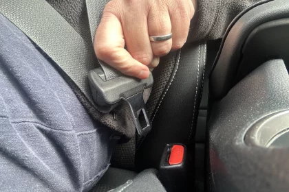 seatbelt being plugged in