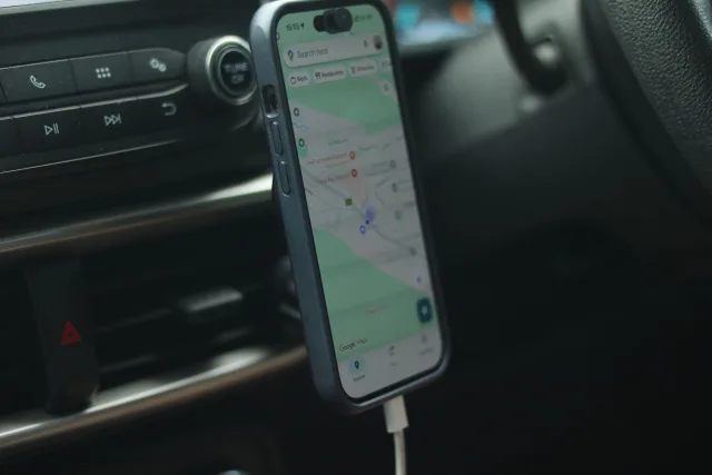 hands-free mobile device secured to dashboard of vehicle