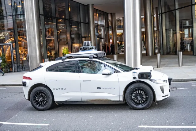 waymo robotaxi parked in London street