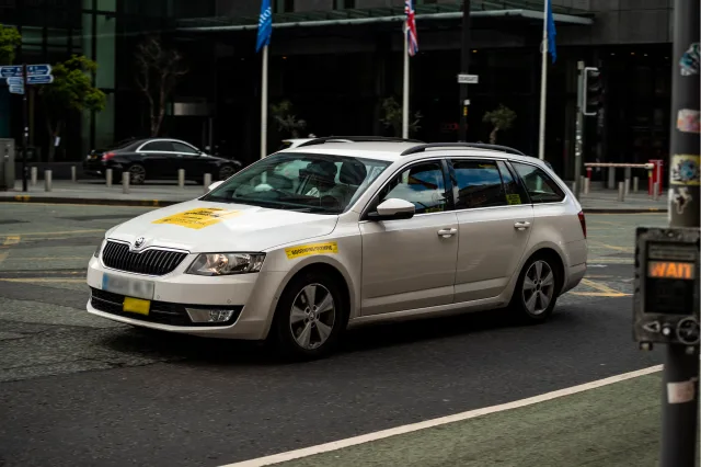 Private hire vehicle on road