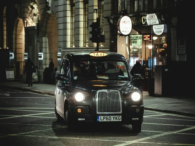 black cab taxi for available for hire at night