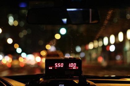 Taxi meter on vehicle dashboard