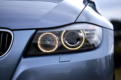 close up shot of silver BMW headlight