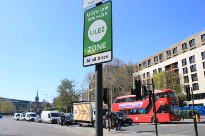 ULEZ sign on a London street with traffic behind